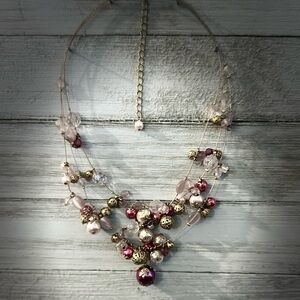 3 string pink and gold necklace